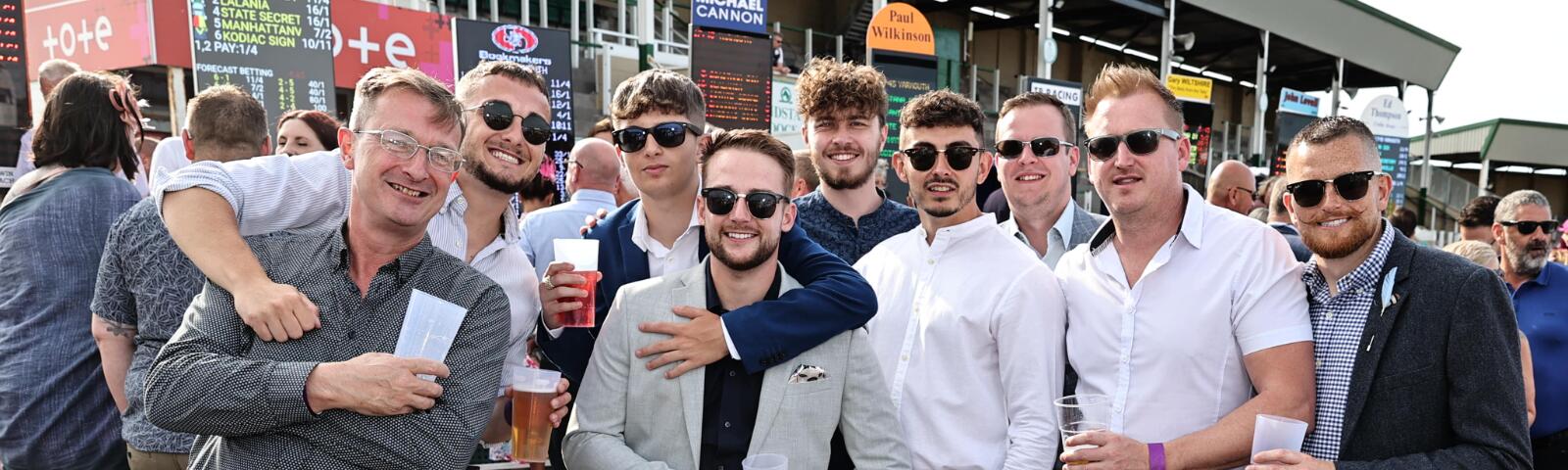 A large group of friends celebrating at Great Yarmouth Races