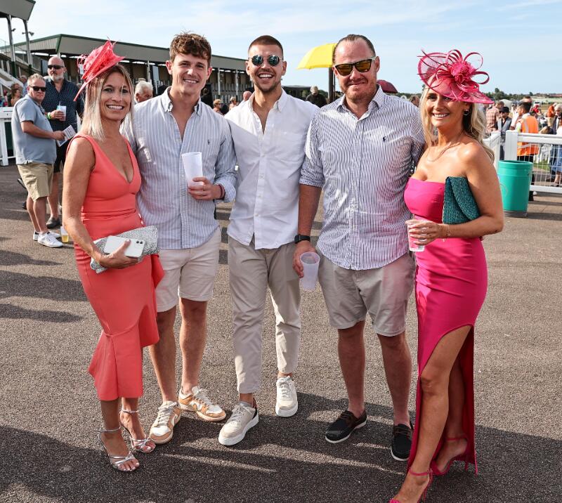 A group of friends in the sunshine at Great Yarmouth races