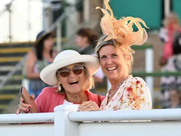 Two ladies at Great Yarmouth pose with big smile for the camera