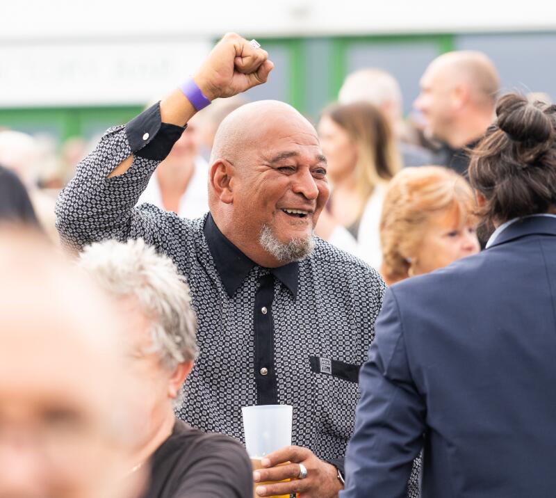 cheering the races winning bet